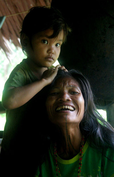 mentawai tribe woman sharp teeth travel to sumatra