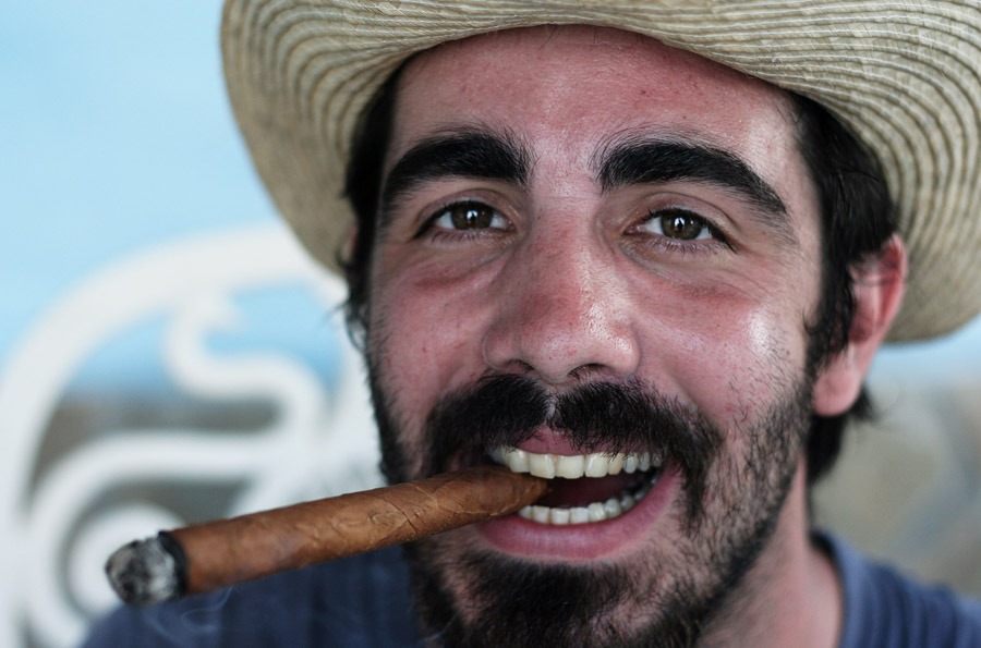 smoking cuban cigar